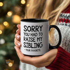 "Funny Parent Mug - 'Sorry You Had to Raise My Sibling - Your Favorite' Humorous Gift for Mom, Dad, or Parents from Their Favorite Child"