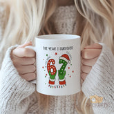 "The Year I Survived" 67 Mug - Funny 2024 Year Review Mug, Cute 67 in Christmas Lights with Santa Hat, Perfect Humorous & Meaningful Gift for Friend, Colleague, Him, Her, Mom, Dad